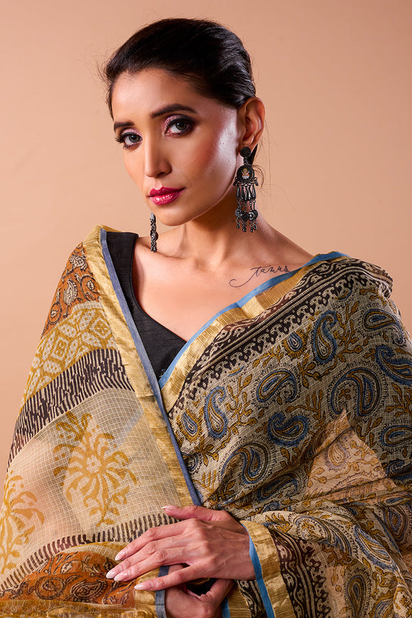 Image of a handloom pure cotton Kota saree showcasing intricate traditional designs in vibrant colors