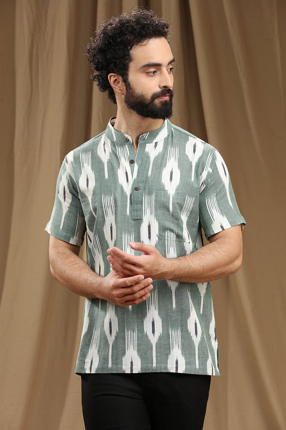 Discover the finest collection of men's cotton ikat short kurtas with half sleeves, combining trendy designs and unmatched comfort. Explore a wide range of traditional and contemporary patterns that showcase the beauty of Indian craftsmanship. Elevate your style with these exquisite kurtas, perfect for any occasion. IKAT COTTON SHORT KURTA,kurtas for men,mens kurtas,men kurtas,men short kurtas,short kurtas for men,mens short kurtas,buy kurtas online,buy online kurtas,mens half sleeves short kurtas,