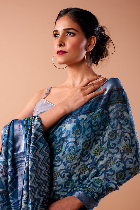 Image of a handloom hand block print pure cotton saree showcasing intricate traditional designs in vibrant colors