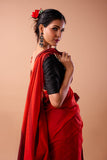 Image of a handloom pure cotton saree showcasing intricate traditional designs in vibrant colors